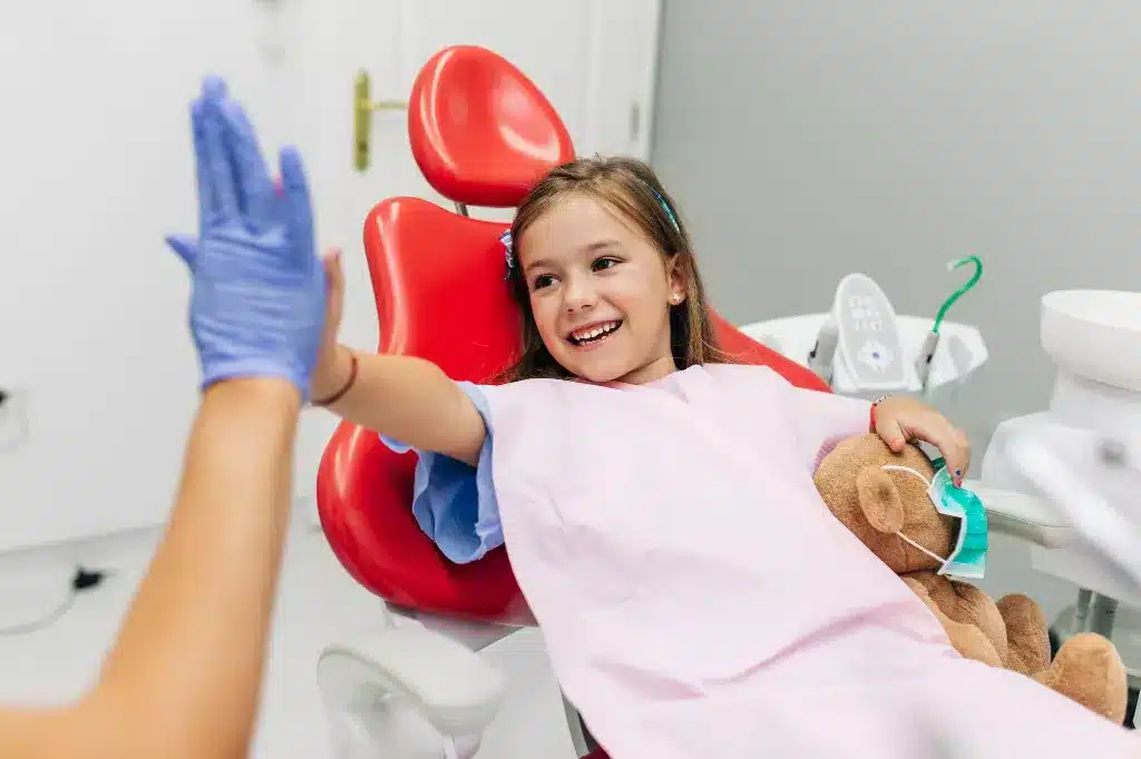 What are the advantages of seeing a pediatric dentist?